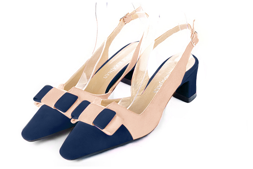 Navy blue and powder pink women's open back shoes, with a knot. Tapered toe. Low kitten heels. Front view - Florence KOOIJMAN